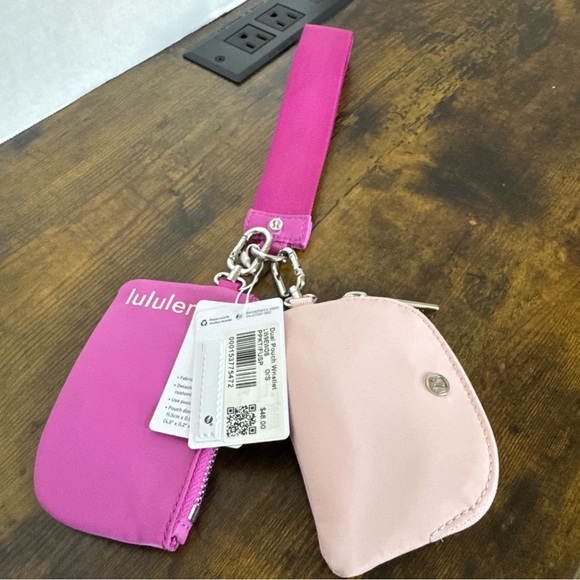 Lululemon DUAL POUCH  WRISTLET In Pow Pink/Fuchsia Pink One Size New - Picture 1 of 6